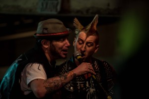the man formally known as Chop and Jaime play the SPDS Anthem during a concert at the warehouse. SPDS stands for Syracuse punks drunks and skins, the club was created as a way to bring all from of punk rockers together and stimulate the culture.